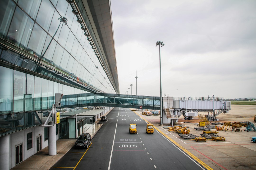 Vehicles at a modern airport terminal